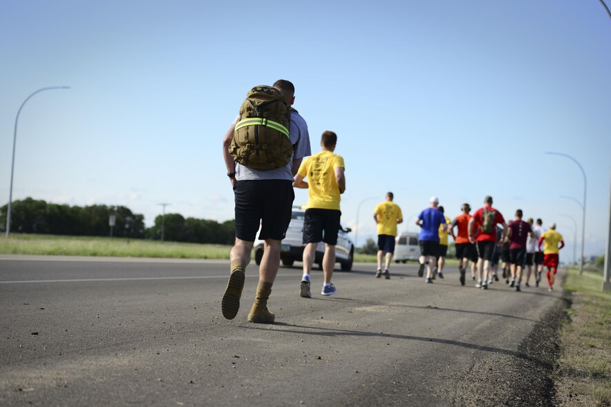 Minot Air Force Base members teamed up with local law enforcement personnel to participate in the 2017 Law Enforcement Torch Run at Minot AFB, N.D., June 7, 2017. Every year more than 400 law enforcement personnel gather to promote the concept of partnership and prosperity as the “Guardians of the Flame”. This event was held in honor of the Special Olympics North Dakota State Summer Games and took place in communities across North Dakota including Bismarck, Grand Forks, Jamestown, Minot, Pembina and Valley City. (U.S. Air Force photo/Tech. Sgt. Evelyn Chavez)