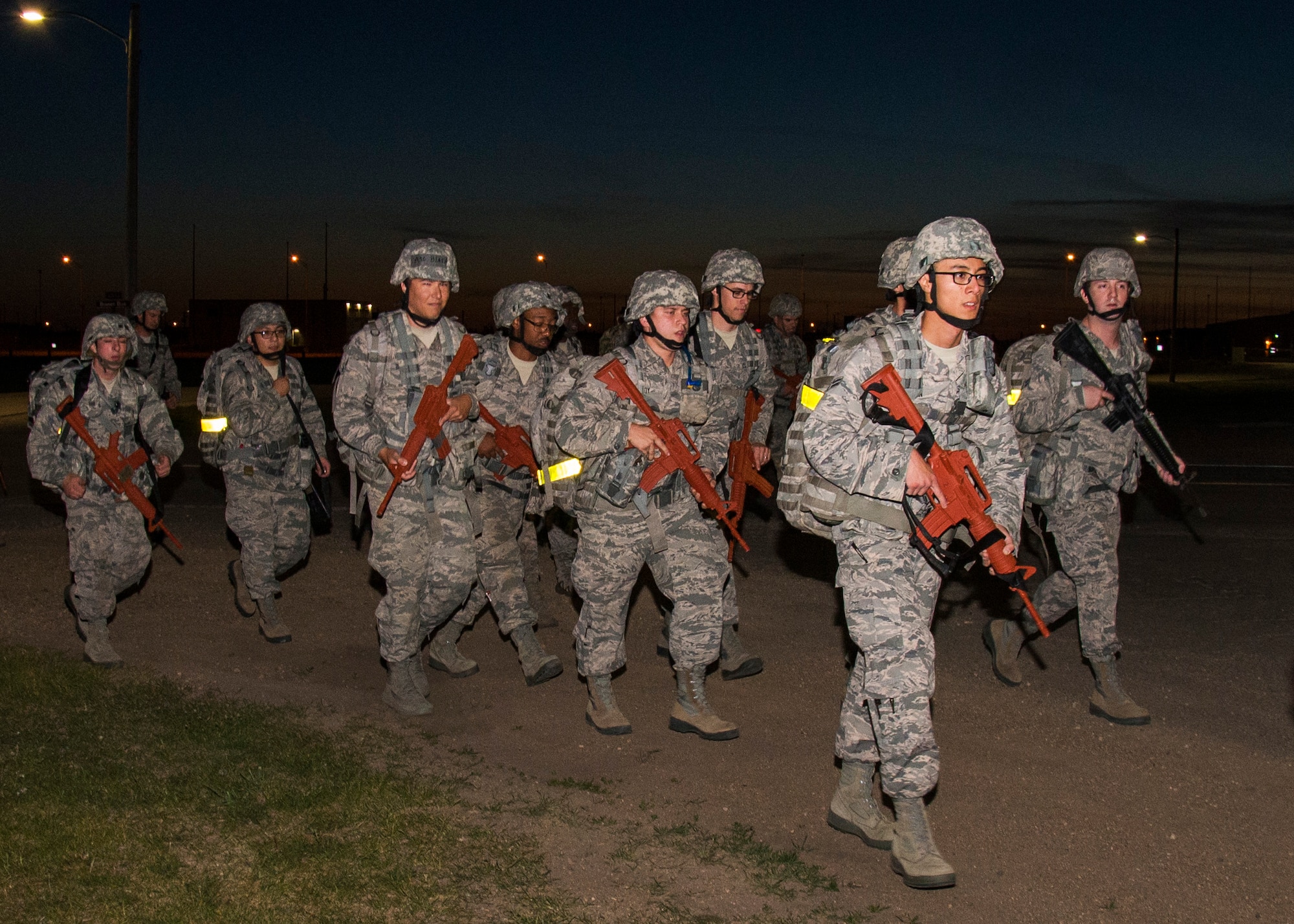 Airmen from the 5th Civil Engineer Squadron participate in a 10K ruck march at Minot Air Force Base, N.D., June 1, 2017. The 5th CES hosted an Expeditionary Training Day for Airmen to help develop and maintain skill sets required for potential deployment. (U.S. Air Force photo/Airman 1st Class Alyssa M. Akers)