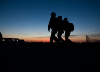 Airmen from the 5th Civil Engineer Squadron participate in a 10K ruck march at Minot Air Force Base, N.D., June 1, 2017. The ruck march marked the beginning of Expeditionary Training Day, an event created to help prepare Airmen for potential deployment. (U.S. Air Force photo/Airman 1st Class Alyssa M. Akers)