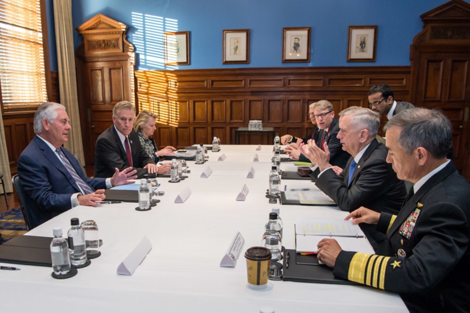 Secretary of Defense Jim Mattis, Chairman of the Joint Chiefs of Staff Gen. Joseph Dunford and Adm. Harry Harris, the commander of U.S. Pacific Command, meet with Secretary of State Rex W. Tillerson and James Carouso, the chargé d'affaires for the U.S. Embassy in Canberra, while visiting Sydney, Australia, June 5, 2017.  