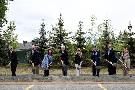 (left to right) Brian Gawne, Vice President of Community Relations, Fisher House Foundation; Terry Parks, President of the Fisher House of Alaska Board; Mary Considine, Chief of Staff, Fisher House Foundation;  Morton Plumb, Secretary of Treasurer of the Fisher House of Alaska Board; Cindy Wilsbach, Fisher House of Alaska Board member; Air Force Lt. Gen. Ken Wilsbach, Alaskan North American Aerospace Defense Command Region, Alaskan Command, and Eleventh Air Force commander; Ed Ford, Social Work Executive to Alaska Veteran Affairs Healthcare, and Jenny Hall, Fisher House manager; dig in during a groundbreaking ceremony for the Fisher House II June 6, 2017 at Joint Base Elmendorf-Richardson. The new facility is scheduled for completion in Spring 2018. (U.S. Air Force photo by Staff Sgt. Sheila deVera)

