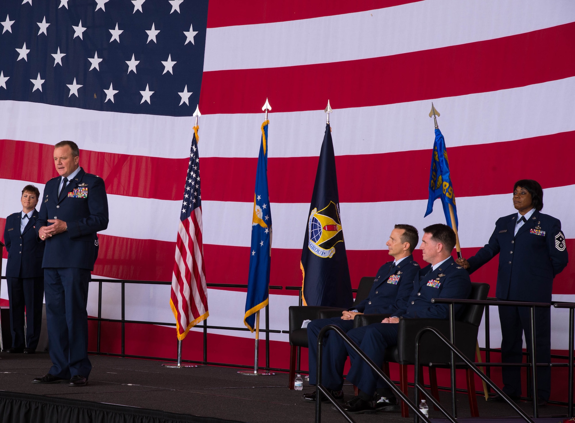 Col. Bruce Cox, 307th Bomb Wing commander, introduces Col. Michael McClanahan to the 489th Bomb Group during a change of command Ceremony at Dyess Air Force Base, Texas, June 3, 2017. The 307th Bomb Wing is the only dual-bomber wing in the Air Force, operating both the B-52 Stratofortress and B-1 Lancer.  (U.S. Air Force photo by Staff Sgt. Jason McCasland/Released)