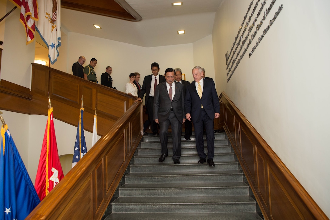 Defense Secretary Jim Mattis walks with Indonesian Coordinating Maritime Affairs Minister Luhut Binsar Panjaitan following a meeting at the Pentagon, June 7, 2017.  DoD photo by Army Sgt. Amber I. Smith