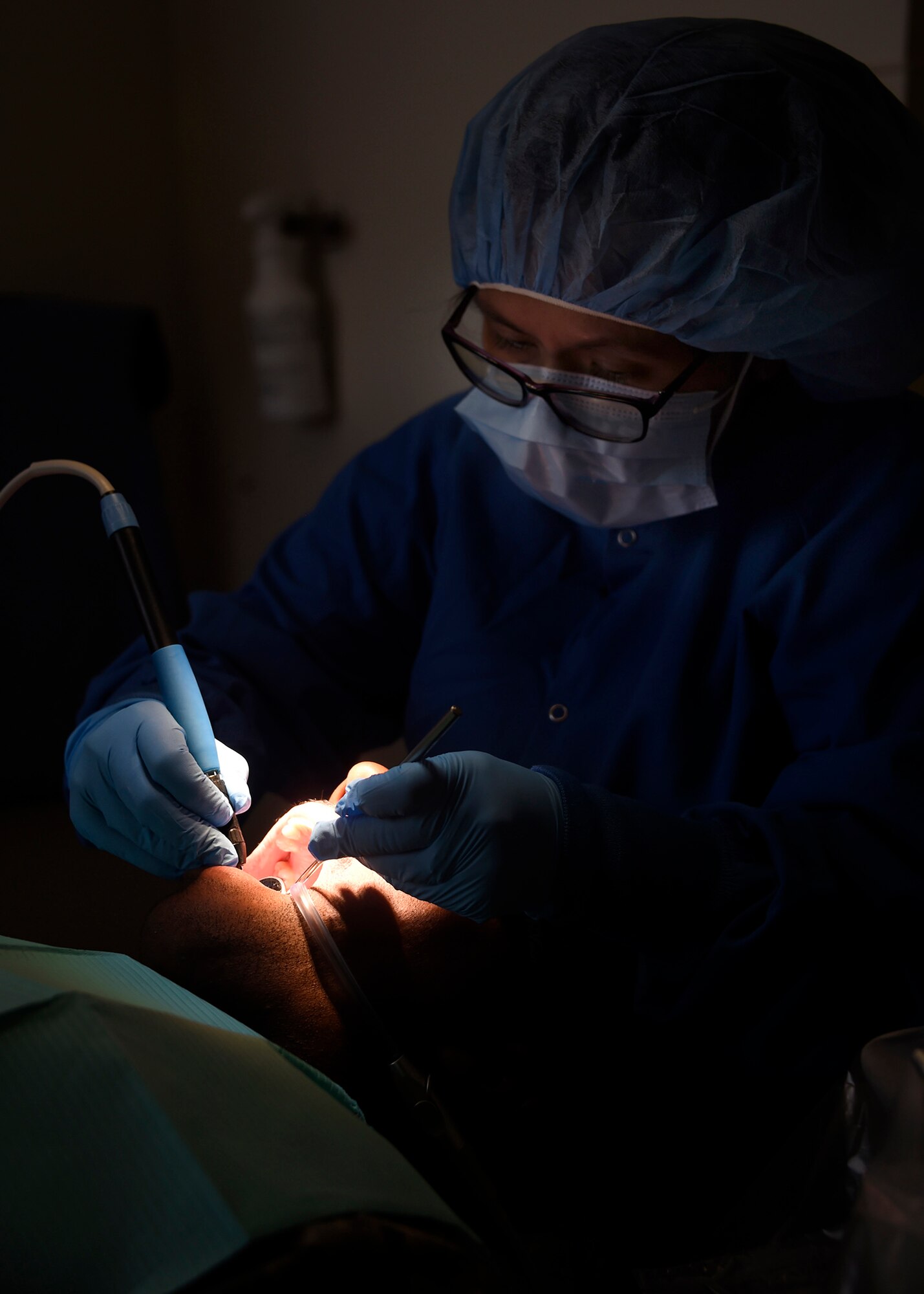Tava Lloyd, 56th Dental Squadron prophy technician cleans a patient’s teeth June 5, 2017 at Luke Air Force Base, Ariz. The 56th DS promotes safety and wellness through great dental care. (U.S. Air Force photo by Senior Airman Devante Williams) 