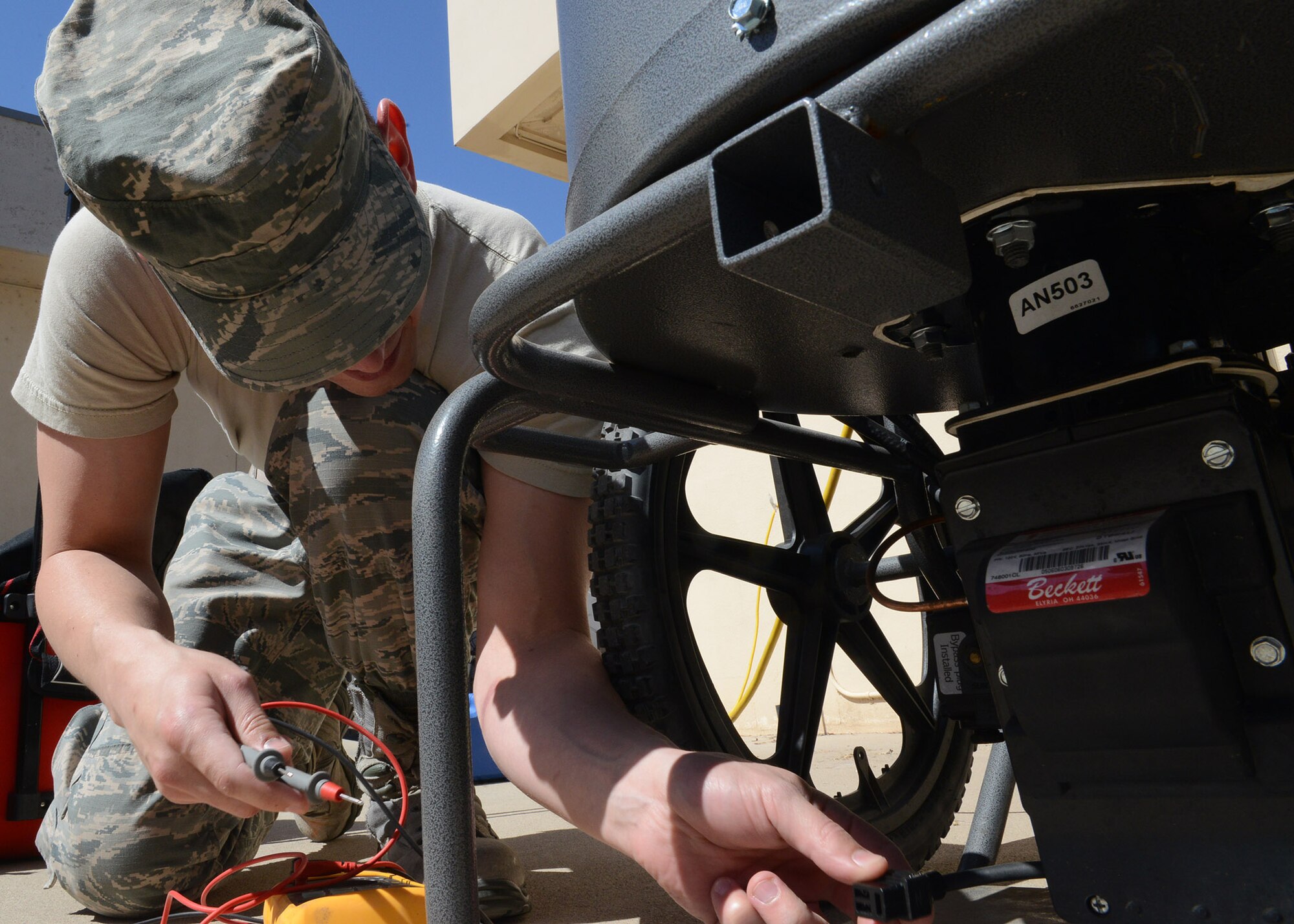 Staff Sgt. Matthew Lyons, 56th Medical Support Squadron biomedical equipment technician, tests a decontamination water heater’s functionality June 5, 2017, at Luke Air Force Base, Ariz. Biomedical equipment technicians maintain all medical equipment in the clinic. (U.S. Air Force photo by Senior Airman James Hensley)