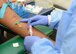 Sarah Fewkes, 56th Medical Support Squadron phlebotomist, takes a blood sample from a patient June 5, 2017, at the Luke Air Force Base laboratory. The laboratory sees approximately 150 to 200 Airmen, family members and retirees a day. (U.S. Air Force photo by Senior Airman James Hensley)