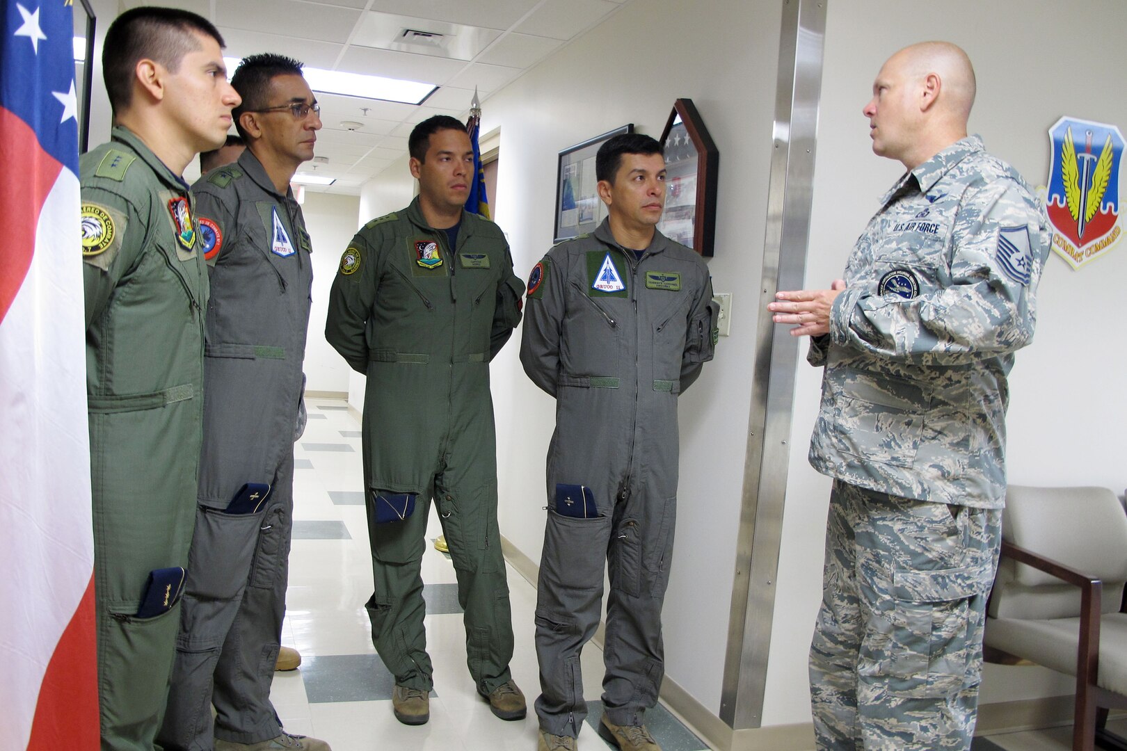 U.S. Air Force Master Sgt. Austin Blessard, Georgia Air National Guard 117th Air Control Squadron weapons and tactics non-commissioned officer in charge, introduces himself to members of the Colombian air force during a State Partnership Program Subject Matter Expert Exchange on Ground Control Intercept with the Georgia Air National Guard, May 30-June 2, 2017, at Hunter Army Airfield in Savannah, Georgia. 
