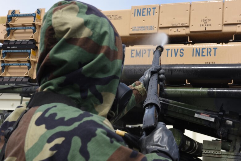 A member of U.S. Army 1-1 Air Defense Artillery decontaminates an MIM-104 Patriot missile system, during a training exercise, May 18, 2017, at Kadena Air Base, Japan. Participants of this exercise included the 1-1 ADA, Japan Ground Self-defense Force and members of the 18th Wing. (U.S. Air Force photo by Senior Airman Nick Emerick) 