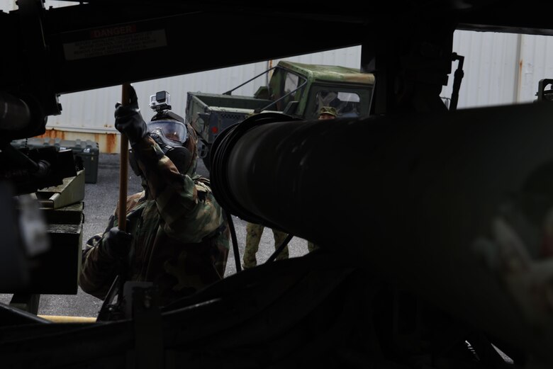 A member of U.S. Army 1-1 Air Defense Artillery decontaminates an MIM-104 Patriot missile system, during a training exercise, May 18, 2017, at Kadena Air Base, Japan. Participants of this exercise included the 1-1 ADA, Japan Ground Self-defense Force and members of the 18th Wing.  (U.S. Air Force photo by Senior Airman Nick Emerick) 