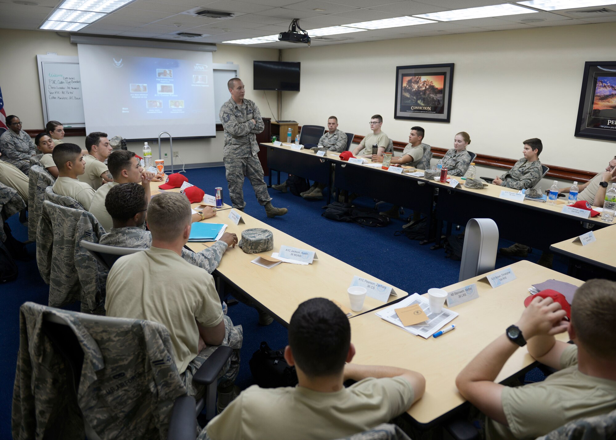 Students in the First Term Airmen’s Course listen as a briefer gives a lesson during Airmanship 300 June 7, 2017, at Andersen Air Force Base, Guam. This month, the Air Force transitioned from what used to be the First Term Airmen’s Center to Airmanship 300 which is the next step of professional development in an enlisted Airman’s developmental path. (U.S. Air Force photo by Senior Airman Cierra Presentado/Released)