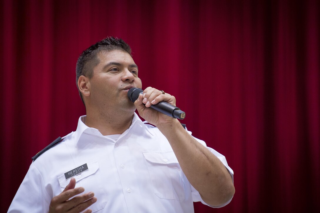 U.S. Army Staff Sgt. Joel Heredia, U.S. Army Japan Band Camp Zama bandsman, sings, “I’ve Got You Under My Skin,” during a Joint Big Band Concert, June 7, 2017, at the Japanese Ministry of Defense, Tokyo, Japan. The Joint Big Band is scheduled to perform at local high schools in Tokyo to show how music can cross cultural barriers and demonstrate the cooperation and friendship between Japan and U.S. forces. (U.S. Air Force photo by Airman 1st Class Donald Hudson)