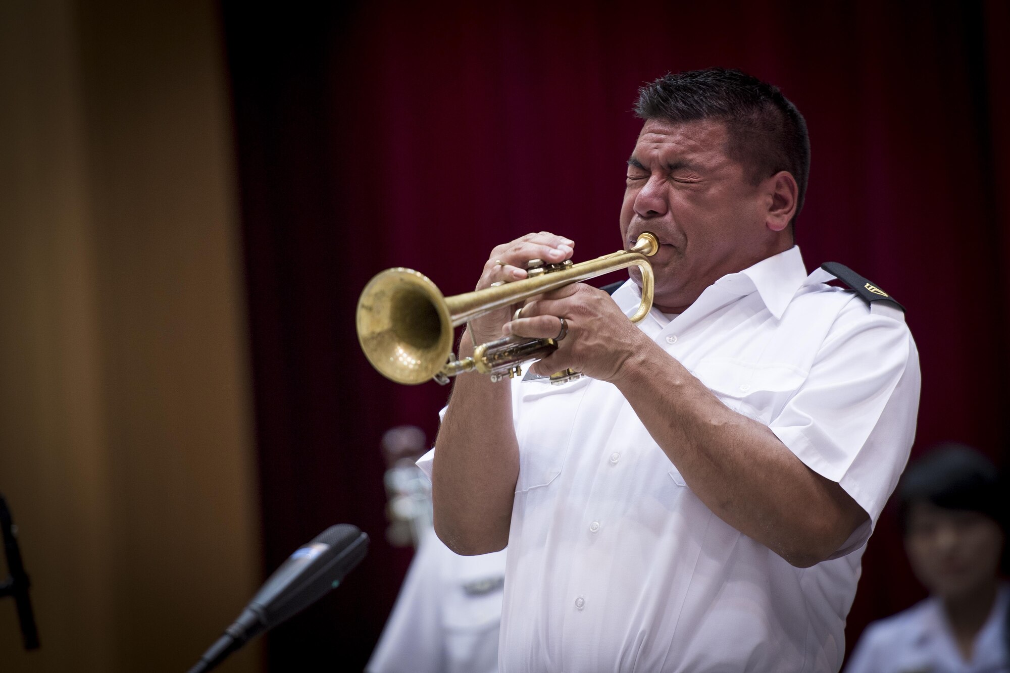 U.S. Army Staff Sgt. Joel Heredia, U.S. Army Japan Band Camp Zama bandsman, preforms a trumpet solo during a Joint Big Band Concert, June 7, 2017, at the Japanese Ministry of Defense, Tokyo, Japan. The concert marked the first time five separate bands from Japan and U.S. forces have come together as one. By highlighting the strong alliance and friendship shared between the Japanese and U.S. forces, the concert demonstrated how music can help strengthen cultural ties. (U.S. Air Force photo by Airman 1st Class Donald Hudson)