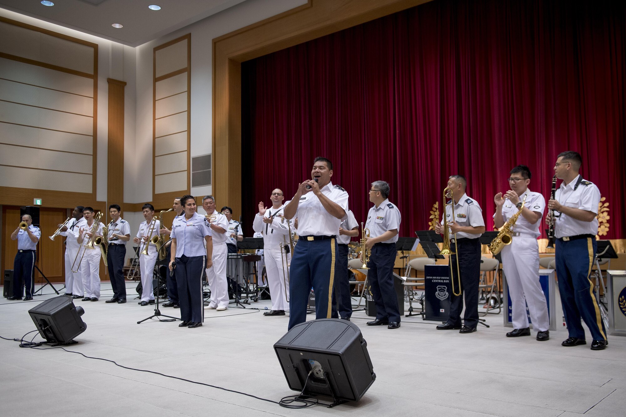 A Joint Big Band plays the song, “When the Saints Come Marching In,” June 7, 2017, at the Japanese Ministry of Defense, Tokyo, Japan. The Joint Big Band included 20 members of Japanese and U.S. forces from across five different bands: the Tokyo Band Sea Legs, Japan Air Self Defense Force Central Band, U.S. Army Japan Band Camp Zama, U.S. Navy 7th Fleet Band and the U.S. Air Force Band of the Pacific. (U.S. Air Force photo by Airman 1st Class Donald Hudson)