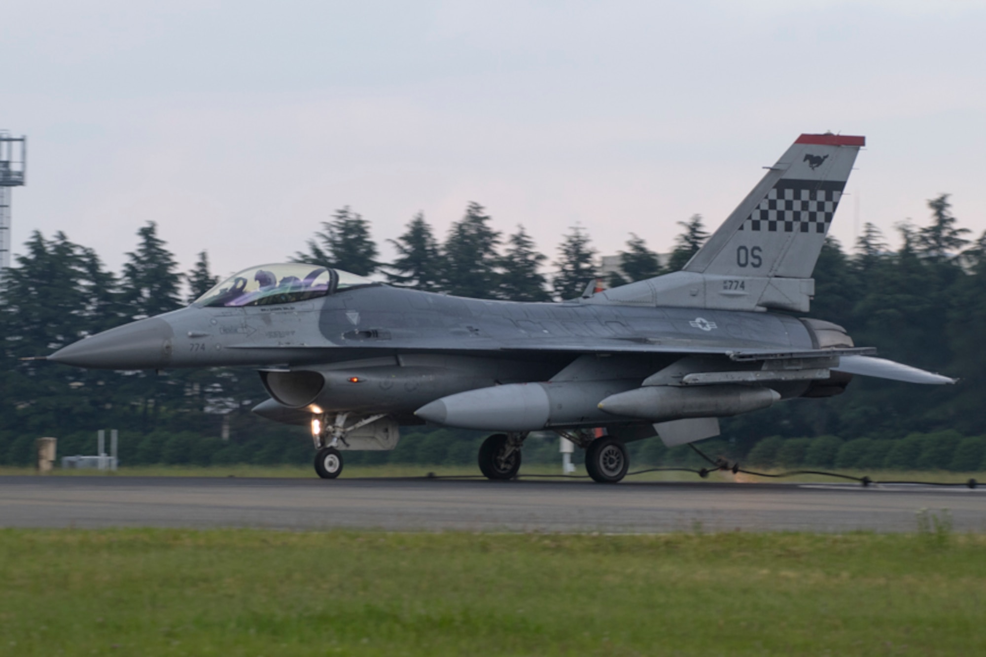 An F-16 Fighting falcon assigned to the 36th Fighter Squadron, Osan Air Base, engages a barrier during an annual certification test of the Aircraft Arresting System at Yokota Air Base, Japan, June 1, 2017. Airmen from the 374 CES and 374th Operations Support Squadron are responsible for setting up the system and logging any deficiencies during the test. (U.S. Air Force photo by Yasuo Osakabe)