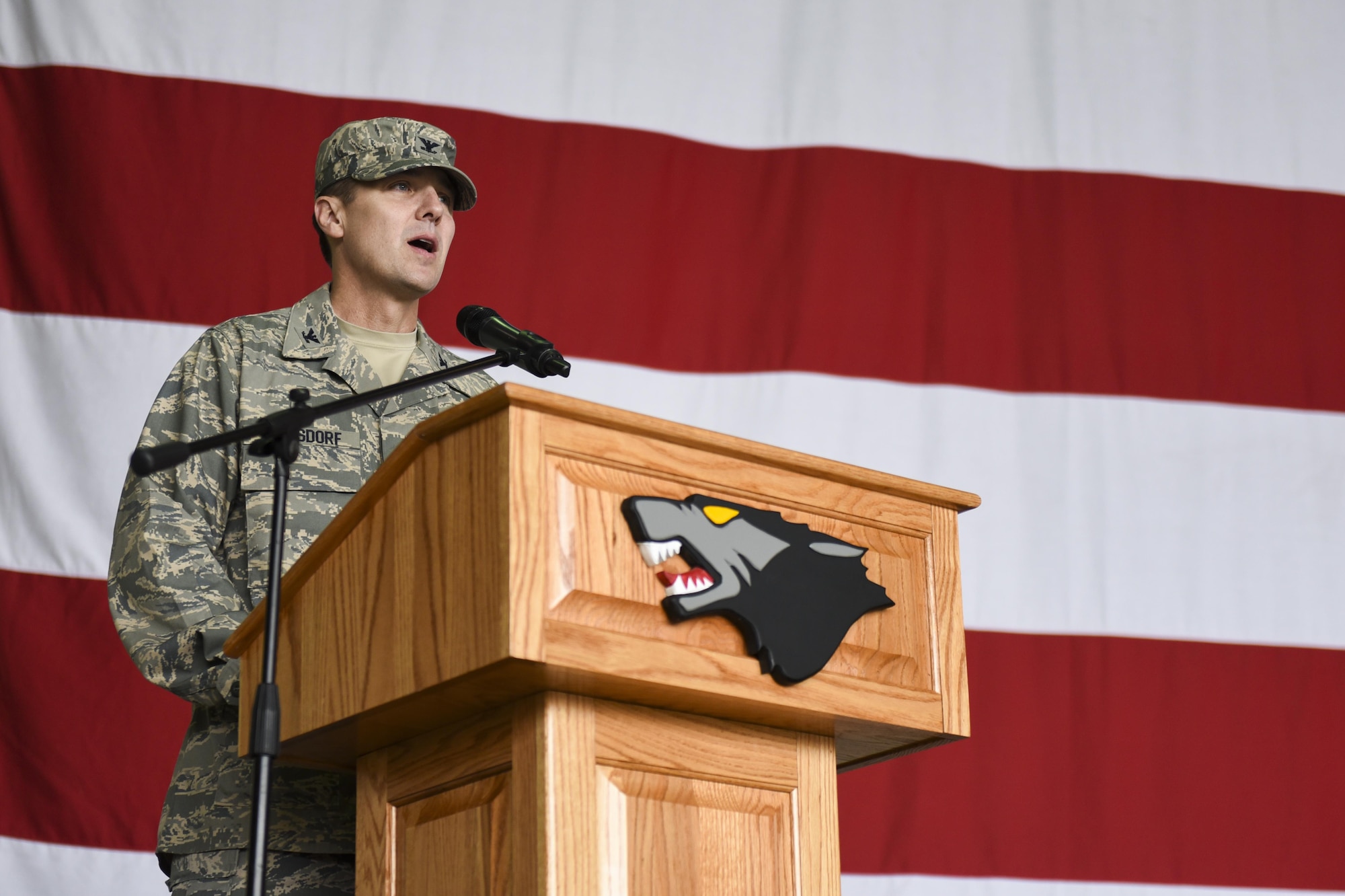 U.S. Air Force Col. Michael Zuhlsdorf, 8th Mission Support Group commander, talks to the 8th Fighter Wing during a change of command ceremony at Kunsan Air Base, Republic of Korea, June 8, 2017. Col. Zuhlsdorf received command of the 8th MSG from Col. Richard McKee during the ceremony and received the title of “Falcon”. (U.S. Air Force photo by Senior Airman Michael Hunsaker/Released)