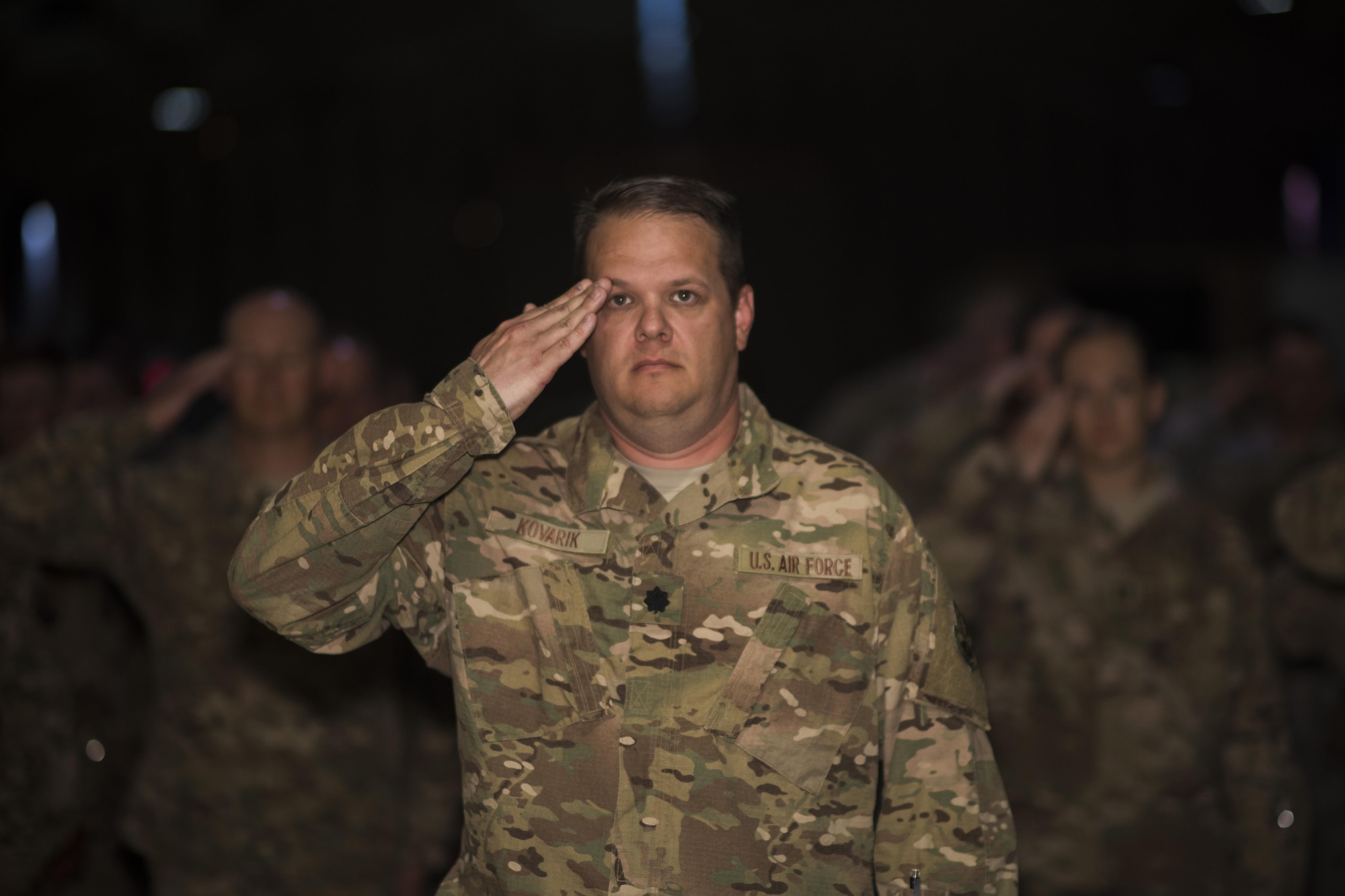 Members of the 332nd Expeditionary Mission Support Group render a salute to their new commander during a change of command ceremony June 4, 2017 in Southwest Asia. The ceremony was held to recognize Col. Christopher K. Fuller as the new commander of the 332nd EMSG. (U.S. Air Force photo/Senior Airman Damon Kasberg)