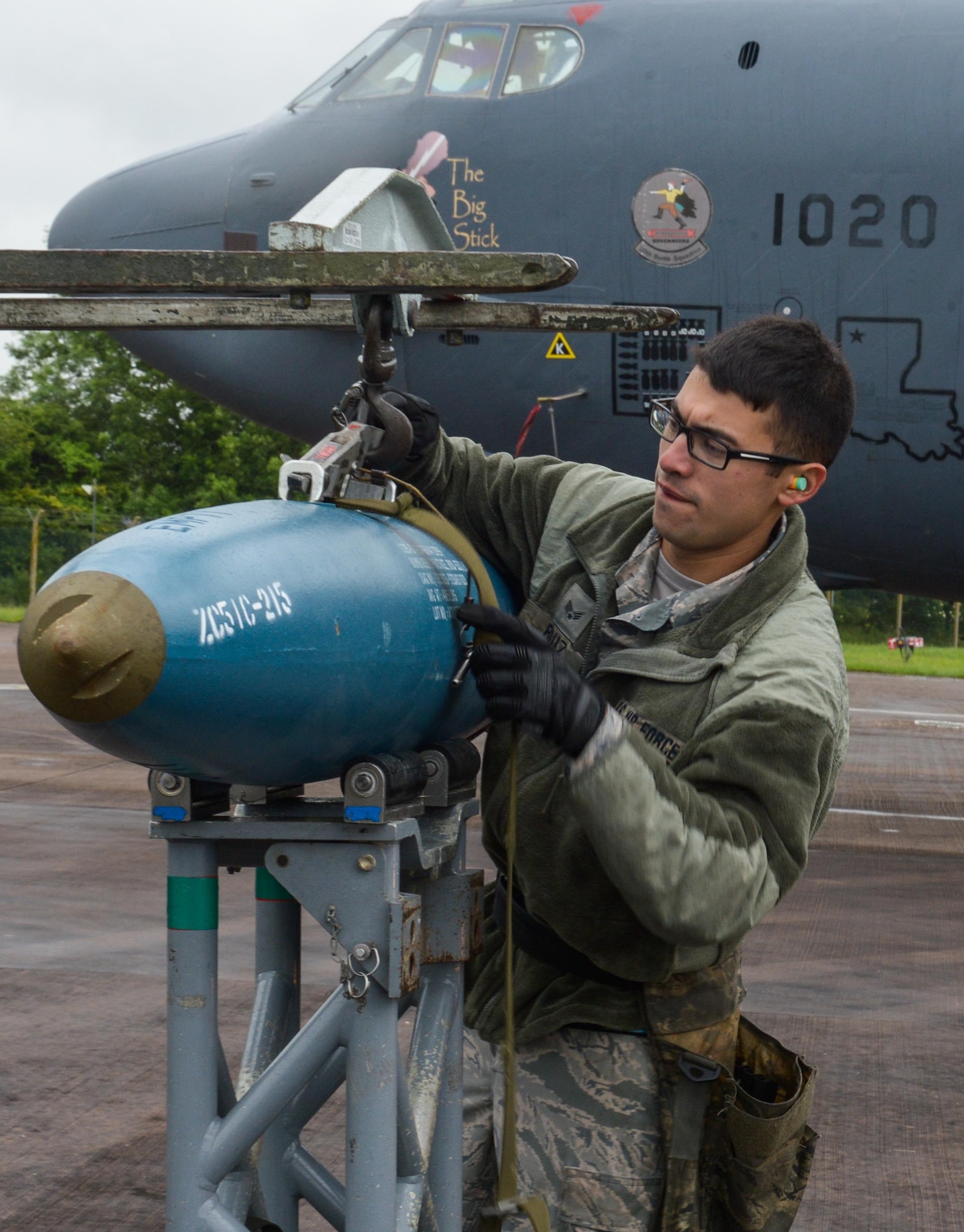 U.S. Air Force Senior Airman Michael Ruiz, 2nd Aircraft Maintenance Squadron load crew team member, fastens a BDU-50 (inert munition) general purpose unguided conventional weapon to a bomb lift truck at Royal Air Force Fairford, U.K., June 5, 2017. Load crews are participating in Saber Strike 2017, an annual, multinational, exercise designed to strengthen interoperability and cohesiveness between NATO allies and partner nations. (U.S. Air Force photo/Senior Airman Curt Beach)