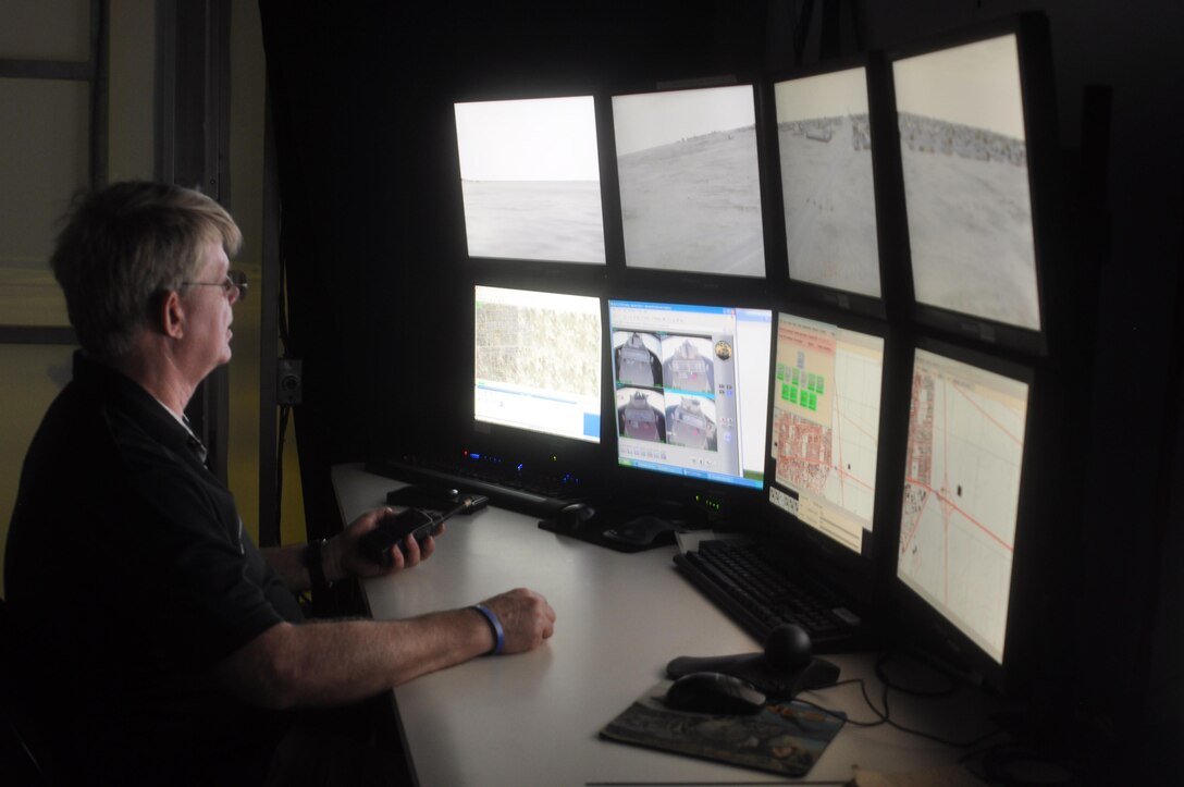 Scott Armitage, convoy simulator operator, throws different obstacles in the way of the convoy participants from the control center.