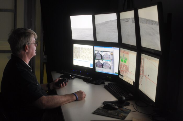 Scott Armitage, convoy simulator operator, throws different obstacles in the way of the convoy participants from the control center.