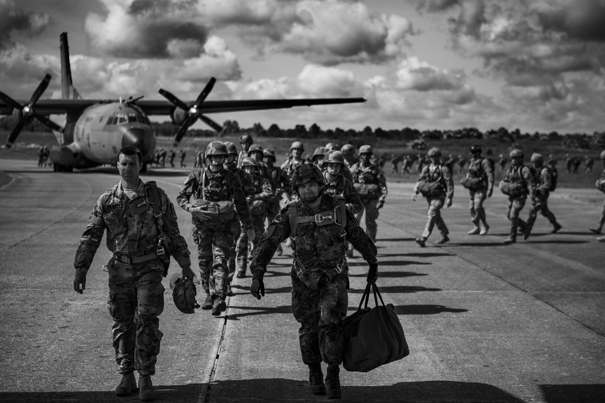 U.S. Air Force C-130J Super Hercules assigned to the 37th Airlift Squadron at Ramstein Air Base, Germany, at Cherbourg-Maupertus Airport, France, June 4, 2017. The modern-day paratroopers recreated air drops similar to the ones on D-Day, June 6, 1944. This event commemorates the 73rd anniversary of D-Day, the largest multinational amphibious landing and operational military airdrop in history, and highlights the U.S.' steadfast commitment to European allies and partners. Overall, approximately 400 U.S. service members from units in Europe and the U.S. are participating in ceremonial D-Day 73 events from May 31-June 7, 2017. (U.S. Air Force photo by Senior Airman Devin Boyer)