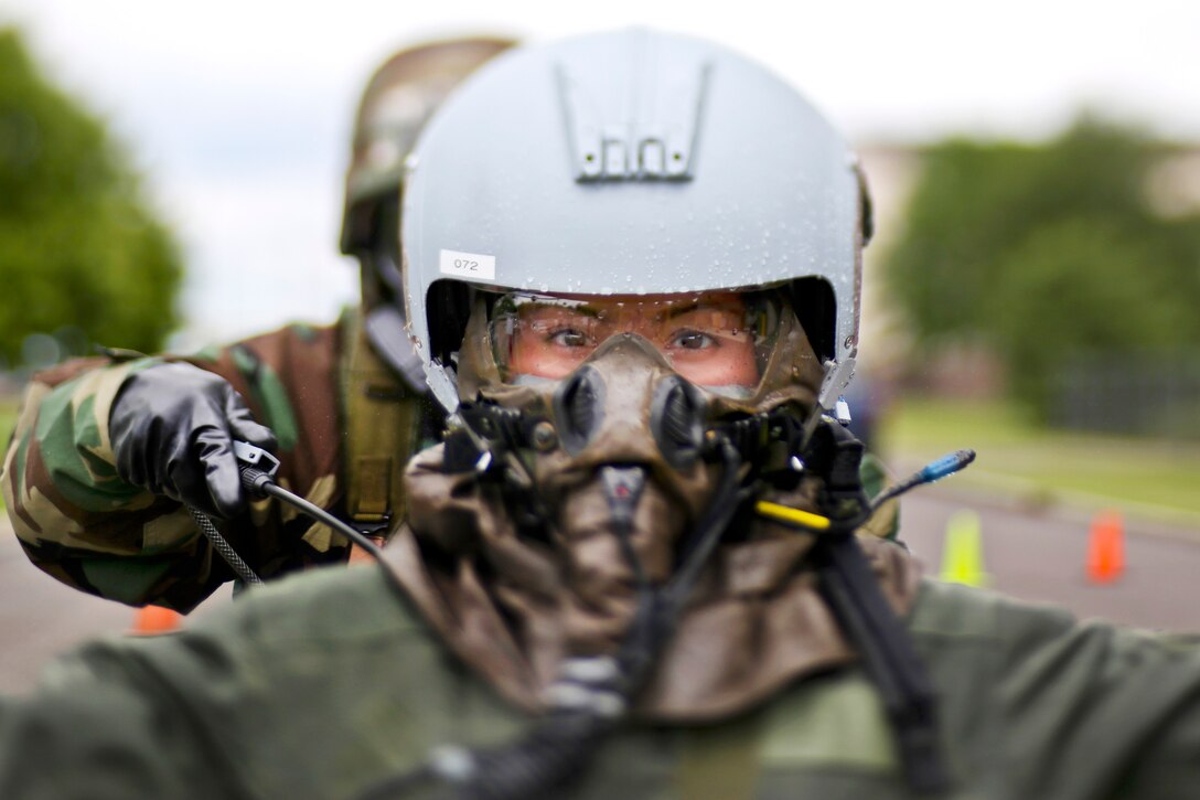 New Jersey Air National Guard Senior Airman Kimberly Moncayo processes through the aircrew contamination control area during an exercise at Joint Base McGuire-Dix-Lakehurst, N.J., June 7, 2017. Moncayo is a boom operator assigned to the 141st Air Refueling Squadron. Air National Guard photo by Master Sgt. Matt Hecht