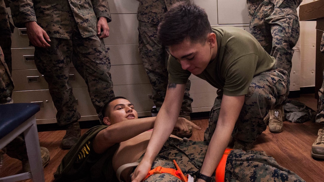 Marines with Echo Company, Battalion Landing Team, 2nd Battalion, 5th Marine Regiment, practice applying tourniquets during a Combat Life Saver class aboard the USS Green Bay (LPD 20), at sea, Mar. 30, 2017. The Marines are currently on patrol as the Ground Combat Element for the 31st MEU. As the Marine Corps' only continuously forward-deployed unit, the 31st Marine Expeditionary Unit's air-ground-logistics team provides a flexible force, ready to perform a wide range of military operations, from limited combat to humanitarian assistance operations, throughout the Indo-Asia-Pacific region. 