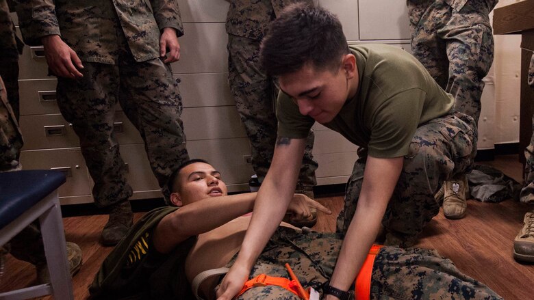 Marines with Echo Company, Battalion Landing Team, 2nd Battalion, 5th Marine Regiment, practice applying tourniquets during a Combat Life Saver class aboard the USS Green Bay (LPD 20), at sea, Mar. 30, 2017. The Marines are currently on patrol as the Ground Combat Element for the 31st MEU. As the Marine Corps' only continuously forward-deployed unit, the 31st Marine Expeditionary Unit's air-ground-logistics team provides a flexible force, ready to perform a wide range of military operations, from limited combat to humanitarian assistance operations, throughout the Indo-Asia-Pacific region. 