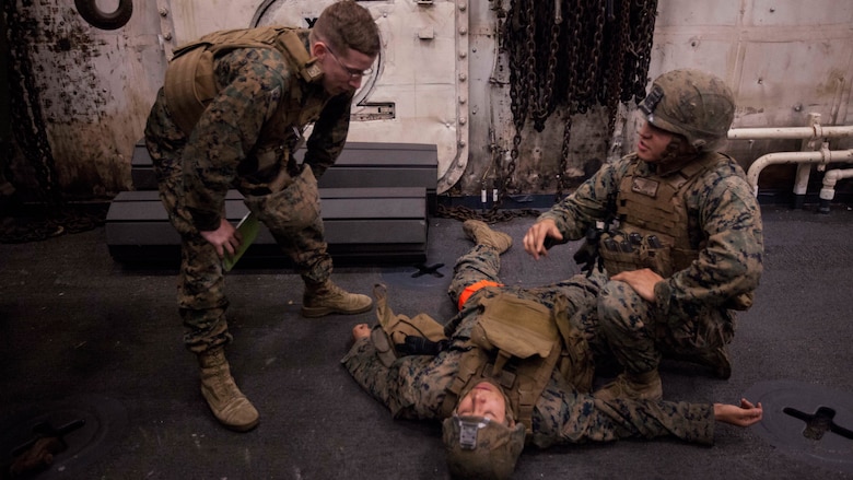 Marines with Echo Company, Battalion Landing Team, 2nd Battalion, 5th Marine Regiment, conduct final examinations for a Combat Life Saver class aboard the USS Green Bay (LPD 20), at sea, Mar. 31, 2017. The Marines are currently on patrol as the Ground Combat Element for the 31st MEU. As the Marine Corps' only continuously forward-deployed unit, the 31st Marine Expeditionary Unit's air-ground-logistics team provides a flexible force, ready to perform a wide range of military operations, from limited combat to humanitarian assistance operations, throughout the Indo-Asia-Pacific region. 