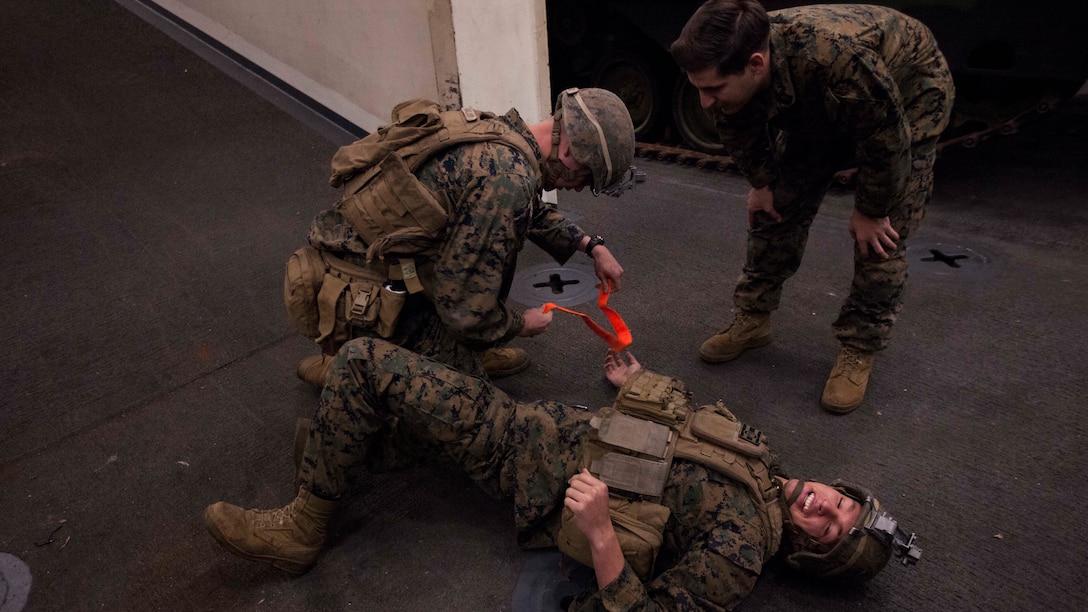 Marines with Echo Company, Battalion Landing Team, 2nd Battalion, 5th Marine Regiment, conduct final examinations for a Combat Life Saver class aboard the USS Green Bay (LPD 20), at sea, Mar. 31, 2017. The Marines are currently on patrol as the Ground Combat Element for the 31st MEU. As the Marine Corps' only continuously forward-deployed unit, the 31st Marine Expeditionary Unit's air-ground-logistics team provides a flexible force, ready to perform a wide range of military operations, from limited combat to humanitarian assistance operations, throughout the Indo-Asia-Pacific region. 