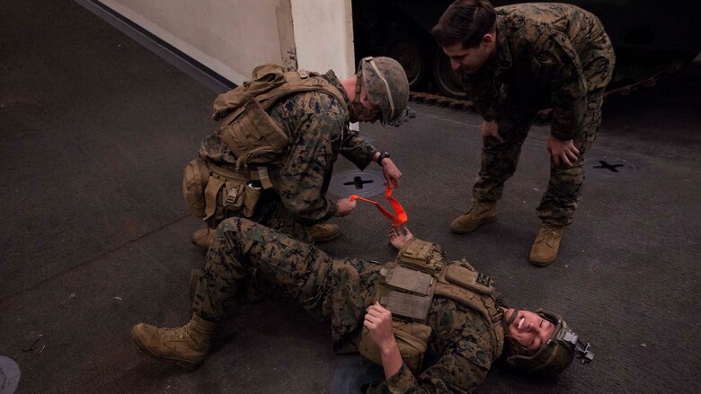Marines with Echo Company, Battalion Landing Team, 2nd Battalion, 5th Marine Regiment, conduct final examinations for a Combat Life Saver class aboard the USS Green Bay (LPD 20), at sea, Mar. 31, 2017. The Marines are currently on patrol as the Ground Combat Element for the 31st MEU. As the Marine Corps' only continuously forward-deployed unit, the 31st Marine Expeditionary Unit's air-ground-logistics team provides a flexible force, ready to perform a wide range of military operations, from limited combat to humanitarian assistance operations, throughout the Indo-Asia-Pacific region. 