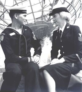 Dress blues, 1965; on the left is a member of the ceremonial honor guard with a new type of hat designed specifically for honor guard details & color guards; new uniform items for these units also included two shoulder patches as shown.