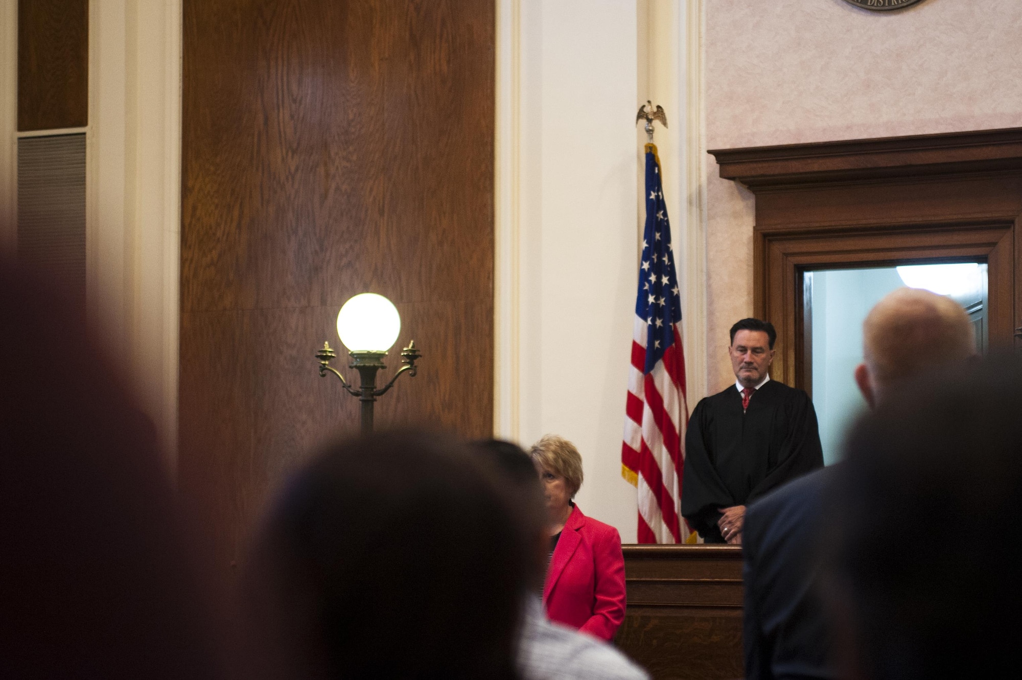 U.S. Magistrate Judge E. Scott Frost, Northern District of Texas San Angelo Division, provides opening remarks for the naturalization ceremony in the O.C. Fisher Building, San Angelo, Texas, June 7, 2017. Frost presided over the ceremony, swearing in 22 new citizens. (U.S. Air Force photo by Senior Airman Scott Jackson/Released)