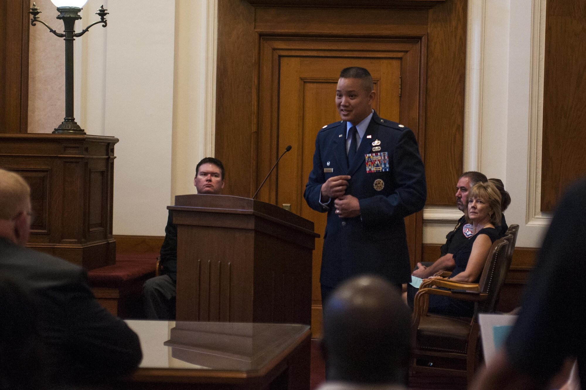 U.S. Air Force Lt. Col. Abraham Salomon, 17th Training Support Squadron commander, speaks to the new naturalized citizens of America in the O.C. Fisher Building, San Angelo, Texas, June 7, 2017. Salomon talked about how honored he was to give the speech and how important this day in their lives is. (U.S. Air Force photo by Senior Airman Scott Jackson/Released)