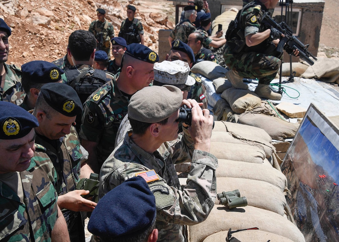 U.S. Army Gen Joseph L. Votel, commander United States Central Command, looks through binoculars at the Lebanese Armed Forces 9th Brigade observation positon at Dahr Al Jabl overlook, near the Syrian border during his visit to Lebanon June 7, 2017. On the trip, Votel met with key leaders of the Lebanese government and military to reaffirm a shared commitment of stability and security in the region. (Department of Defense photo by U.S. Air Force Tech Sgt. Dana Flamer)