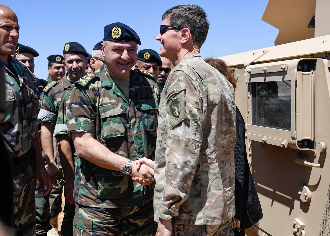 U.S. Army Gen Joseph L. Votel, commander United States Central Command, is greeted by  Gen Joseph Aoun, commander Lebanese Armed Forces, during his visit to Dahr Al Jabl overlook June 7, 2017. On the trip, Votel met with key leaders of the Lebanese government and military to reaffirm a shared commitment of stability and security in the region. (Department of Defense photo by U.S. Air Force Tech Sgt. Dana Flamer)