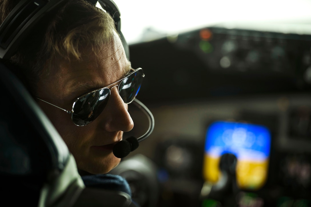 Air Force Capt. Donald Hart talks with his crew before taxiing a KC-135R Stratotanker aircraft during Baltic Operations 2017 at Powidz Air Base, Poland, June 7, 2017. Hart is a pilot assigned to the 351st Air Refueling Squadron. The exercise is designed to enhance flexibility and invulnerability to strengthen combined response capabilities, as well as demonstrate resolve among allied and partner nations' forces to ensure stability in, and if necessary defend, the Baltic Sea region. Air Force photo by Staff Sgt. Jonathan Snyder 