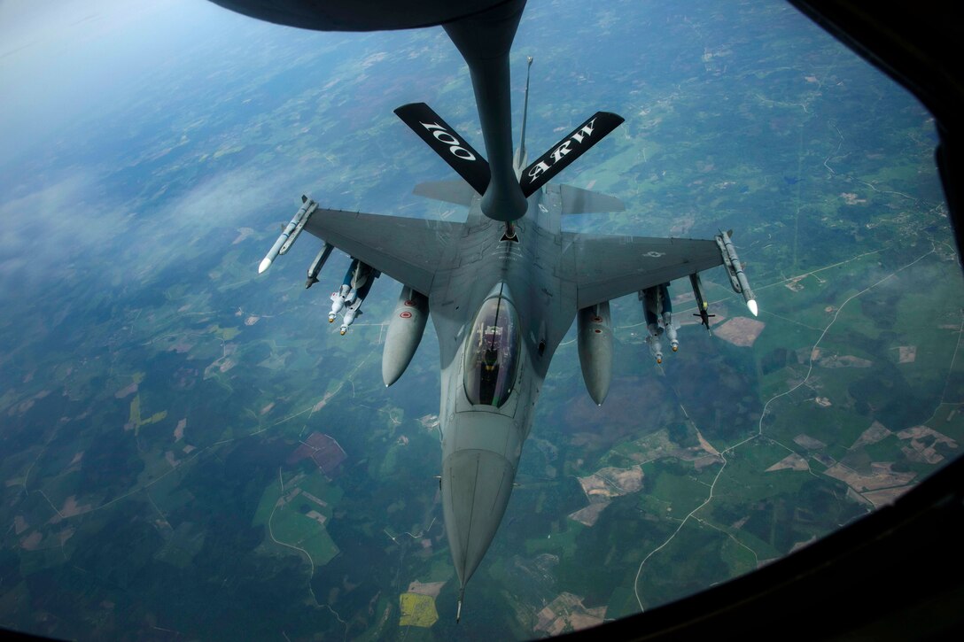 An F-16 Fighting Falcon aircraft refuels from a KC-135R Stratotanker during Baltic Operations 2017 over Latvia, June 7, 2017. The pilot is assigned to the 510th Fighter Squadron. Air Force photo by Staff Sgt. Jonathan Snyder