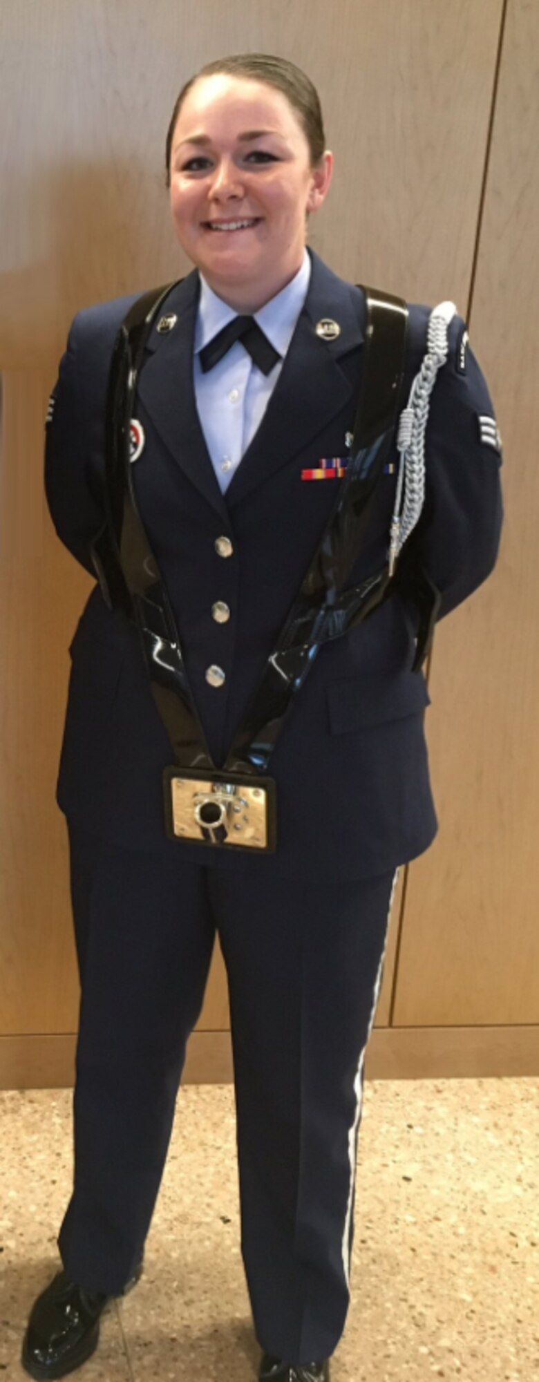 Senior Airman Kayla-Rae Ross, 10th Medical Support Squadron, is one of 38 Airmen at the U.S. Air Force Academy yo receive their Community College of the Air Force degrees, June 6, 2017. (Photo by Laurie Wilson) . 