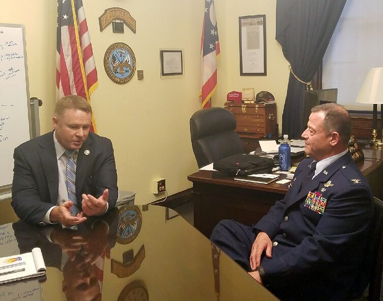 Col. Adam Willis, 445th Airlift Wing commander, visits with Congressman Warren Davidson, the Ohio 8th district representative to the United States Congress, during a visit to Capitol Hill June 7, 2017. The visit gave Col. Willis the opportunity to meet with various Ohio congressional representatives and discuss issues affecting the wing. (Lt. Col. Cynthia Harris)