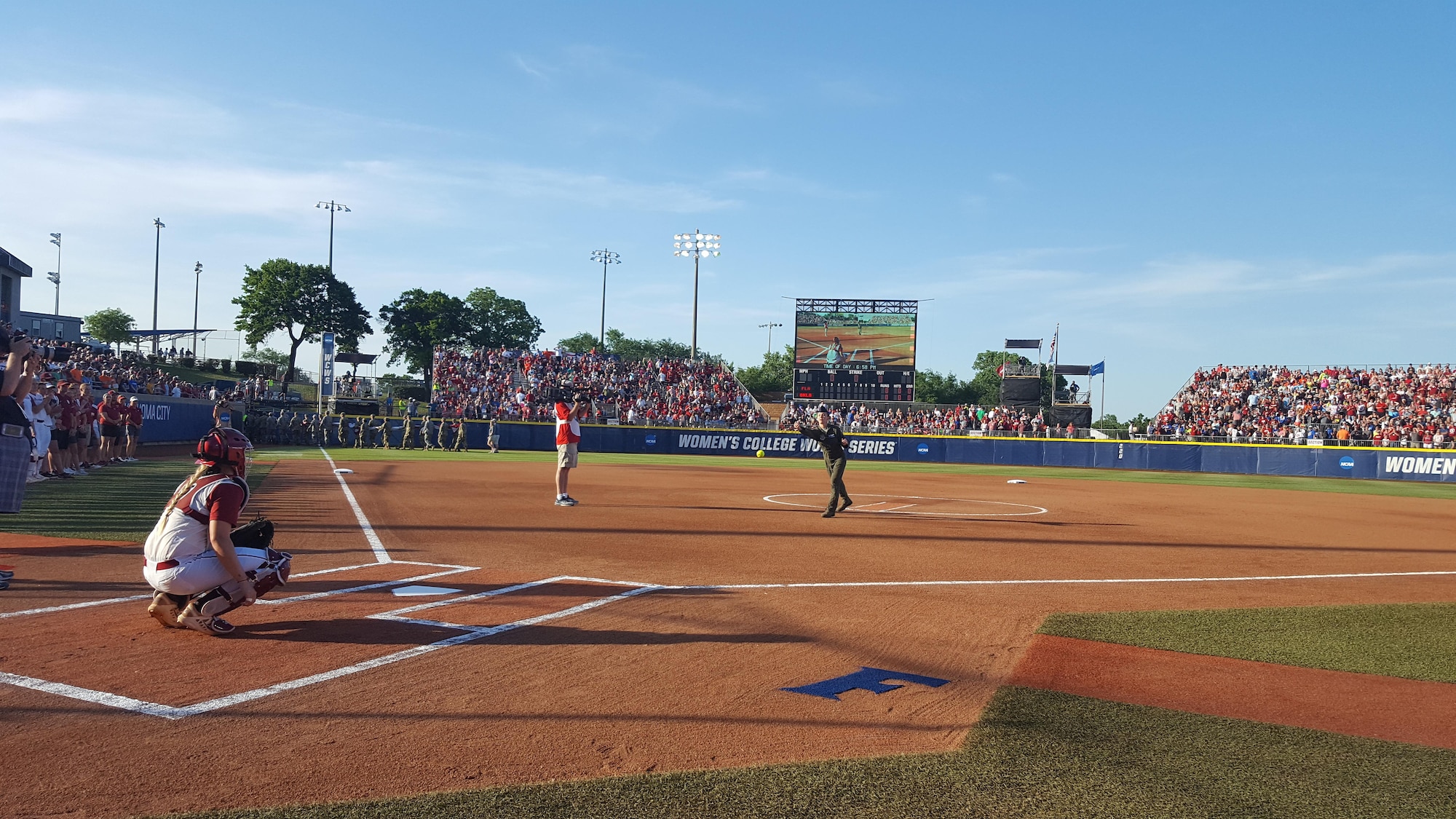 Staff Sgt. Danielle Warren, 344th Air Refueling Squadron KC-135 Stratotanker boom operator, throws the ceremonial first pitch at the NCAA Women’s College World Series, June 6, 2017, at USA Softball Hall of Fame Stadium, OGE Energy Field, Oklahoma City, Oklahoma. The NCAA held a military appreciation night to thank service members and veterans for their service. (U.S. Air Force photo/2nd Lieutenant Carla Stefaniak)