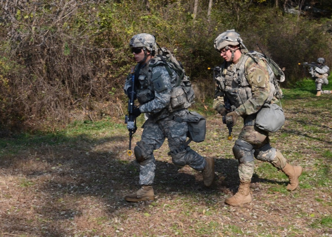 Soldiers from 1st Battalion, 16th Infantry Regiment, 1st Armored Brigade Combat Team, 1st Infantry Division, along with leaders from the 2nd Infantry Division/Republic of Korea-U.S. Combined Division and 8th U.S. Army, conduct a demonstration of force on force engagement training systems for members of the South Korean army at Camp Humphreys, South Korea, Nov. 8, 2016. Army photo by Staff Sgt. Warren Wright