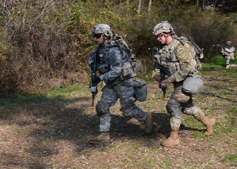 Soldiers from 1st Battalion, 16th Infantry Regiment, 1st Armored Brigade Combat Team, 1st Infantry Division, along with leaders from the 2nd Infantry Division/Republic of Korea-U.S. Combined Division and 8th U.S. Army, conduct a demonstration of force on force engagement training systems for members of the South Korean army at Camp Humphreys, South Korea, Nov. 8, 2016. Army photo by Staff Sgt. Warren Wright