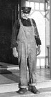 Unknown keeper, working overalls; station & date unknown.