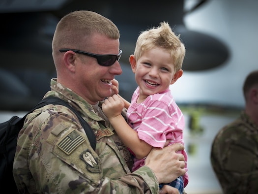 Senior Master Sgt. Jeffrey Schillawski, 71st Aircraft Maintenance Unit superintendent, embraces his son, Noah, during a redeployment, June 6, 2017, at Moody Air Force Base, Ga. The 41st and 71st Rescue Squadrons were recently deployed to Southwest Asia where they provided combat search and rescue capabilities in support of Operation Inherent Resolve. (U.S. Air Force photo by Airman 1st Class Lauren M. Sprunk)