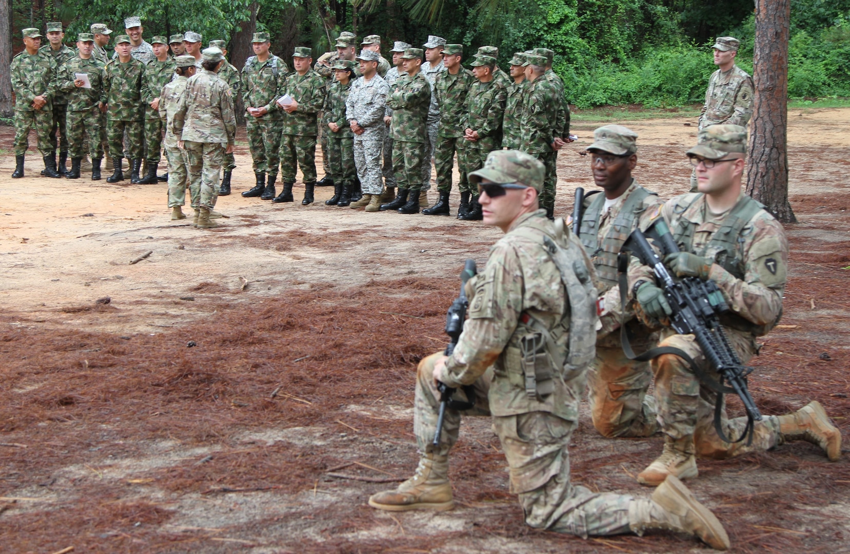 Colombian sergeants major receive safety brief and explanation of the buddy team live fire movement as drill sergeant cadets perform dry run at Fort Jackson, S.C., June 7. 