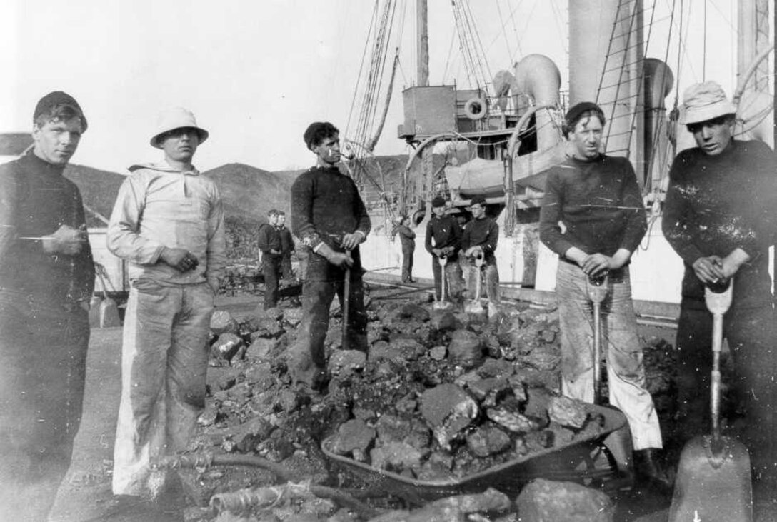 Enlisted, various uniforms, USRC Bear crewmen, coaling ship, circa 1895