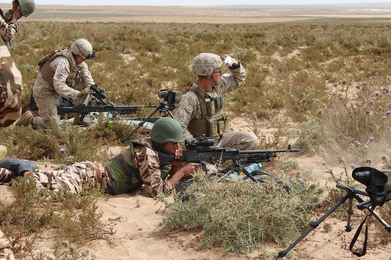 TIFNIT, Morocco - U.S. Marines instruct their counterparts from the Royal Moroccan Armed Forces on proper weapons techniques during Exercise African Lion 2017. African Lion is a combined, multilateral exercise designed to improve interoperability and mutual understanding of each nation’s tactics, techniques and procedures while demonstrating the strong bond between the nation’s militaries. (Photo by Thomas Flatley)