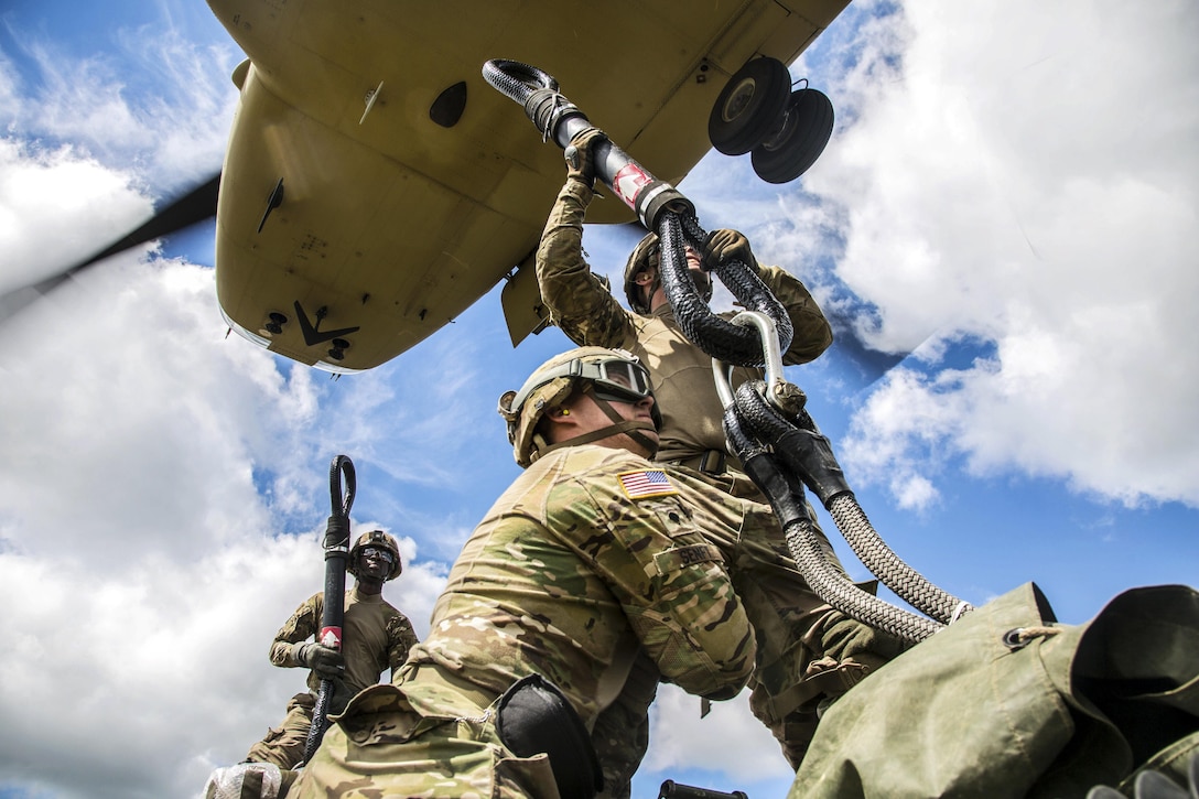 Solders conduct slingload and air assault training with M777A2 howitzers during Saber Strike 2017 at the Bemowo Piskie training area near Orzysz, Poland, June 7, 2017. Saber Strike is an annual U.S. Army Europe-led multinational combined forces exercise aimed at enhancing the NATO alliance throughout the Baltic region and Poland. Army photo by Spc. Stefan English