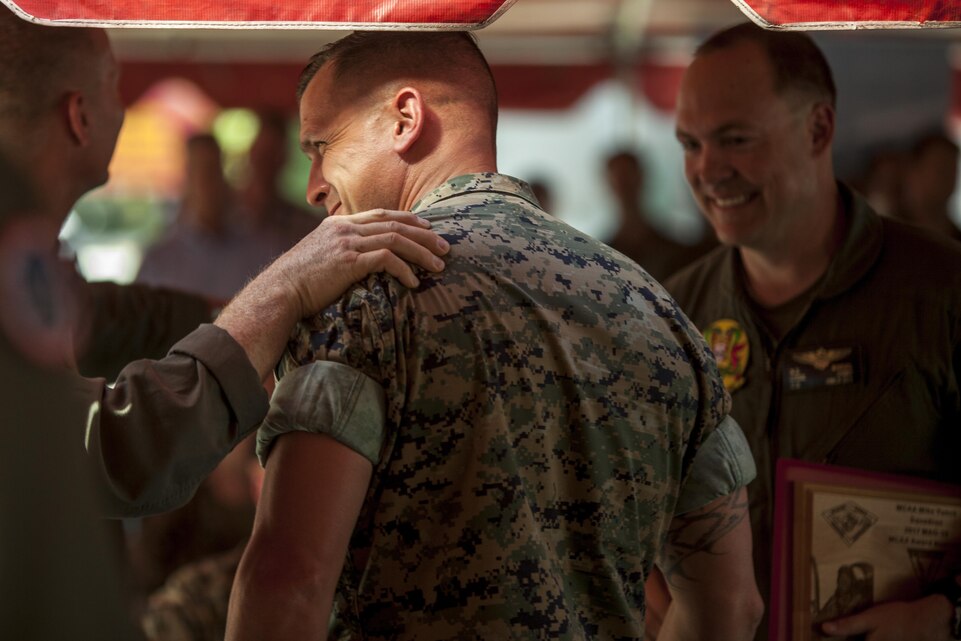 U.S. Marine Air Group 39 and 16 Alumni present an award during a ceremony to honor Marine Aviators from across the Marine Air Ground Task Force at Marine Corps Air Station Camp Pendleton, Calif., April 21, 2017.  As the oldest Marine Corps air facility on the west coast, and the birthplace to a host of Air-Ground integration innovations, the Air Station will celebrate alongside Marine Corps Base Camp Pendleton’s 75th Anniversary. (U.S. Marine Corps Photo by Lance Cpl. Ryan Kierkegaard)