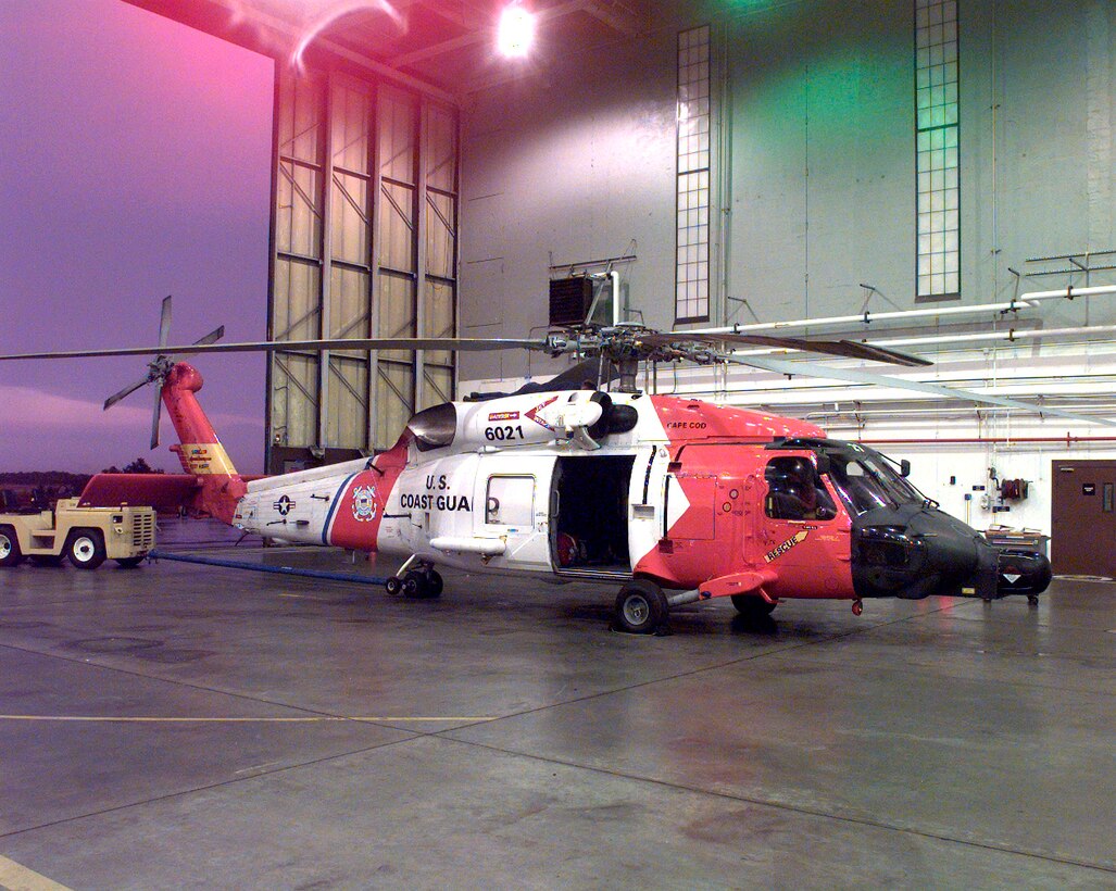 Air Station Cape Cod, Massachusetts
Original photo caption: "A U.S. Coast Guard HU-60 J Jayhawk helicopter sits ready in an Air Station Cape Cod hangar."; photo is dated 22 July 1999; photo number 990722-I-5664M-522 (FR); photo by PA1 Pete Milnes, USCG.